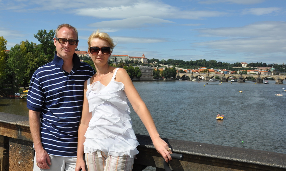 Kevin and Lida in Prague with Charles Bridge in the background